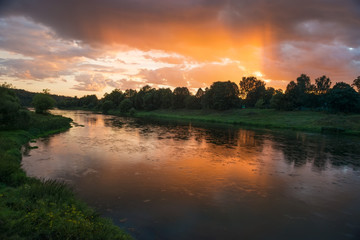 Beautiful summer sunset in the river
