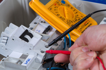 electrician at work with an appliance