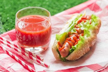 Hotdog with big sausage and fresh lettuce