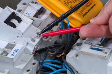 electrician at work with an appliance