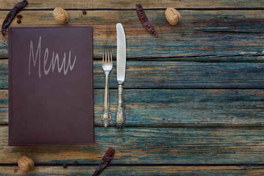 Vintage Restaurant Menu On A Rustic Wood Background