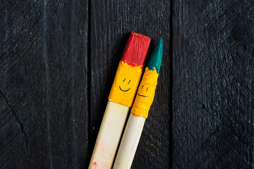 Colored brushes smile fun and happy.