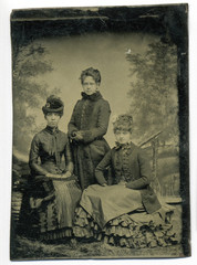 Tintype, circa 1880, USA, of three women posed in studio