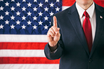 Politician: Man With Finger In Number One Position