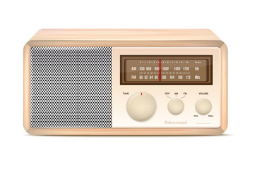 Wooden vintage radio on white background