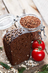 Bread and jar with buckwheat
