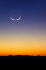 Obraz premium Beautiful new moon at sunset in Madagascar