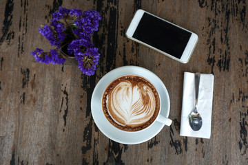 Cup of mocha coffee on wood table