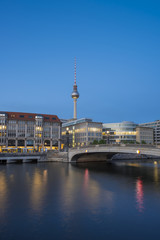 Berlin Cityscape, TV Tower (Fernsehturm) and bridge (Friedrichsbruecke) over river Spree at evening, Berlin Mitte, Germany, Europe
