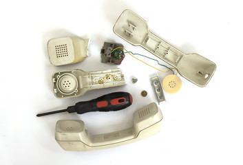 Broken Old Telephone Handset , top view, on White Background.