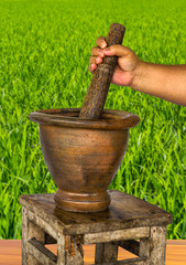 Handle mortar pestle pounding.