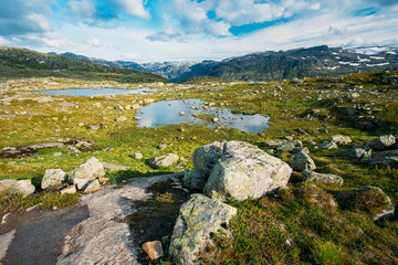 Fototapeta premium Mountains Landscape with Blue Sky and Lake in Norway. Scandinavi