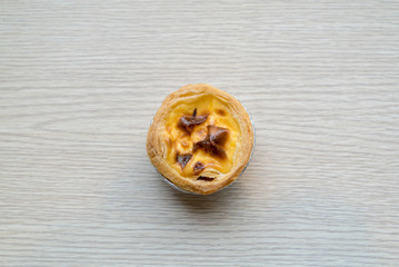 Egg tart on wooden table