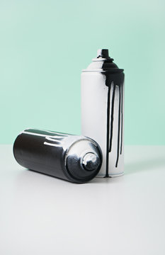 black and white spray paint bottle