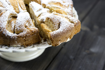 Traditional italian apple pie on a wooden table