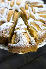 Traditional italian apple pie on a wooden table
