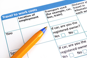 Travel to work costs application form with ballpoint pen