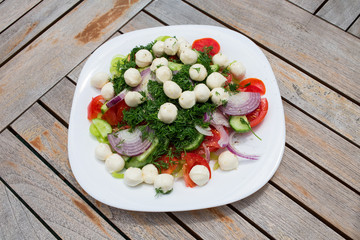 Delicious summer salad in caprese style.