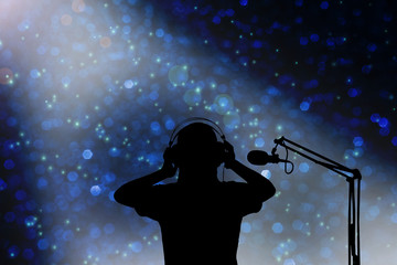 Silhouette singer women with headphone and microphone, concept v
