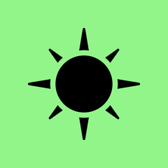 sun icon on a green background
