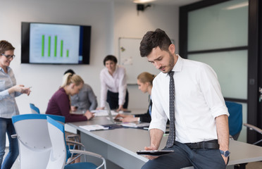 young business man with tablet at office meeting room