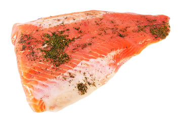 Piece of salty rainbow trout with a dill isolated on a white background