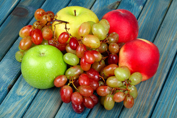 fresh ripe fruits on wooden table