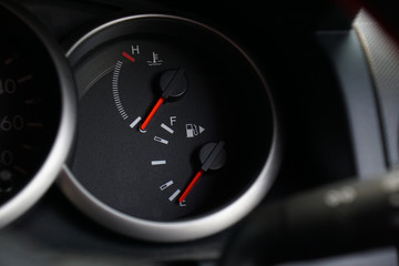 Fuel and temperature gauges on dashboard