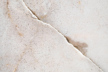 Naklejka premium Closeup surface cracked marble floor texture background