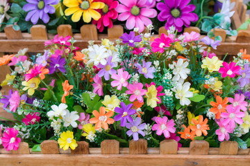 Fototapeta na wymiar Colorful artificial flowers