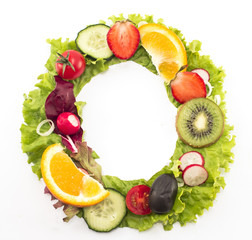 Letter O made of salad and fruits