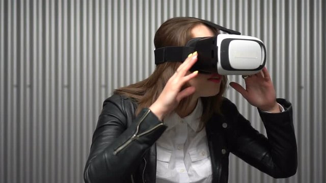 woman getting experience using VR-headset glasses of virtual reality 