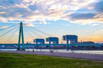 Severins Bridge and landmark Crane Houses (in German: Kranhaus) situated along Rhine River in Cologne 