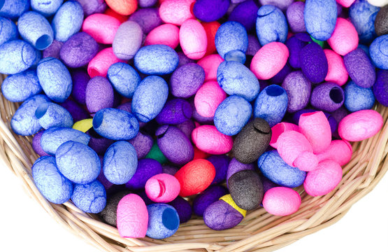 colorful silkworm cocoons in basket