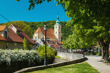 Fototapeta na wymiar Catholic church and river in the center of Samobor, town in northern Croatia