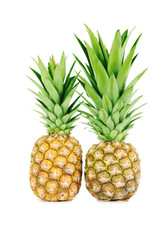 Fototapeta premium Ripe pineapples isolated on a white