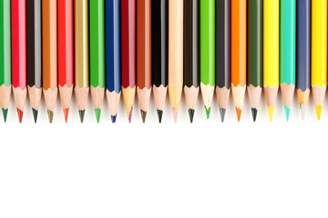 Drawing colourful pencils on a white background, close up