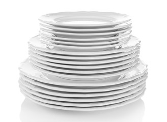 Stacked white dishes isolated on white