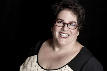 Beautiful Heavy Set Middle-Aged Woman wearing Glasses in Studio