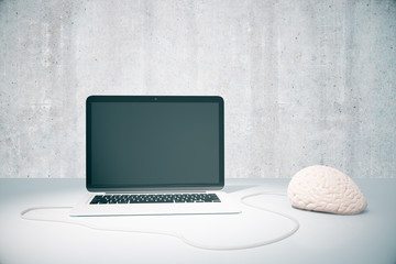 Laptop connected to brain