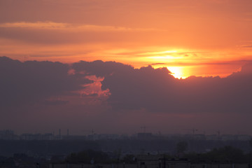 Fototapeta premium sunset on the background of the city from a height