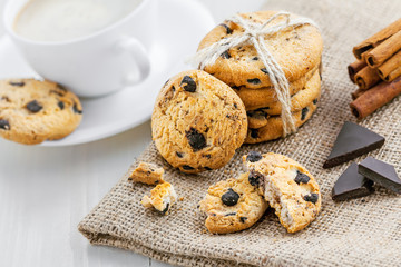 Chip cookies with chocolate. Biscuits and coffee for breakfast on a table.