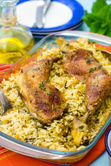 Chicken legs with saffron rice and spices