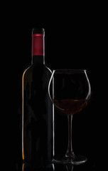 bottle of wine with a glass