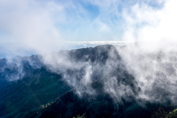 Barranco de Benchijigua on the Canary Island of La Gomera in clouds formed over regions within the...