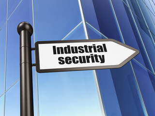 Fototapeta premium Safety concept: sign Industrial Security on Building background