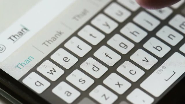 Typing message on mobile phone thank you.