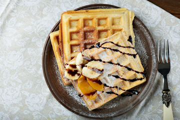 belgium waffles on rustic background