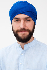 Meditation. Portrait of a young bearded man in a turban