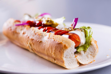Fresh home made hot dog on a plate
